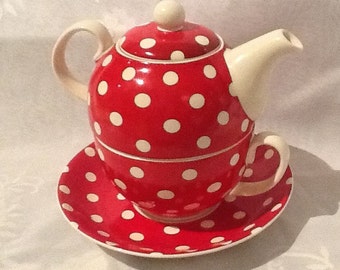 A Red and White Polka Dot Tea Set for One