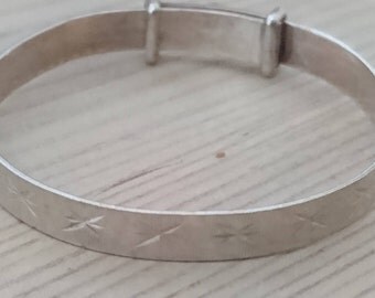 Small vintage sterling silver childs slide bangle