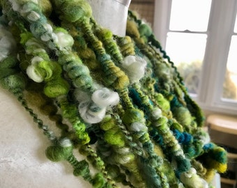 REDUCED! Shades of Green Blue hand spun bulky art yarn.