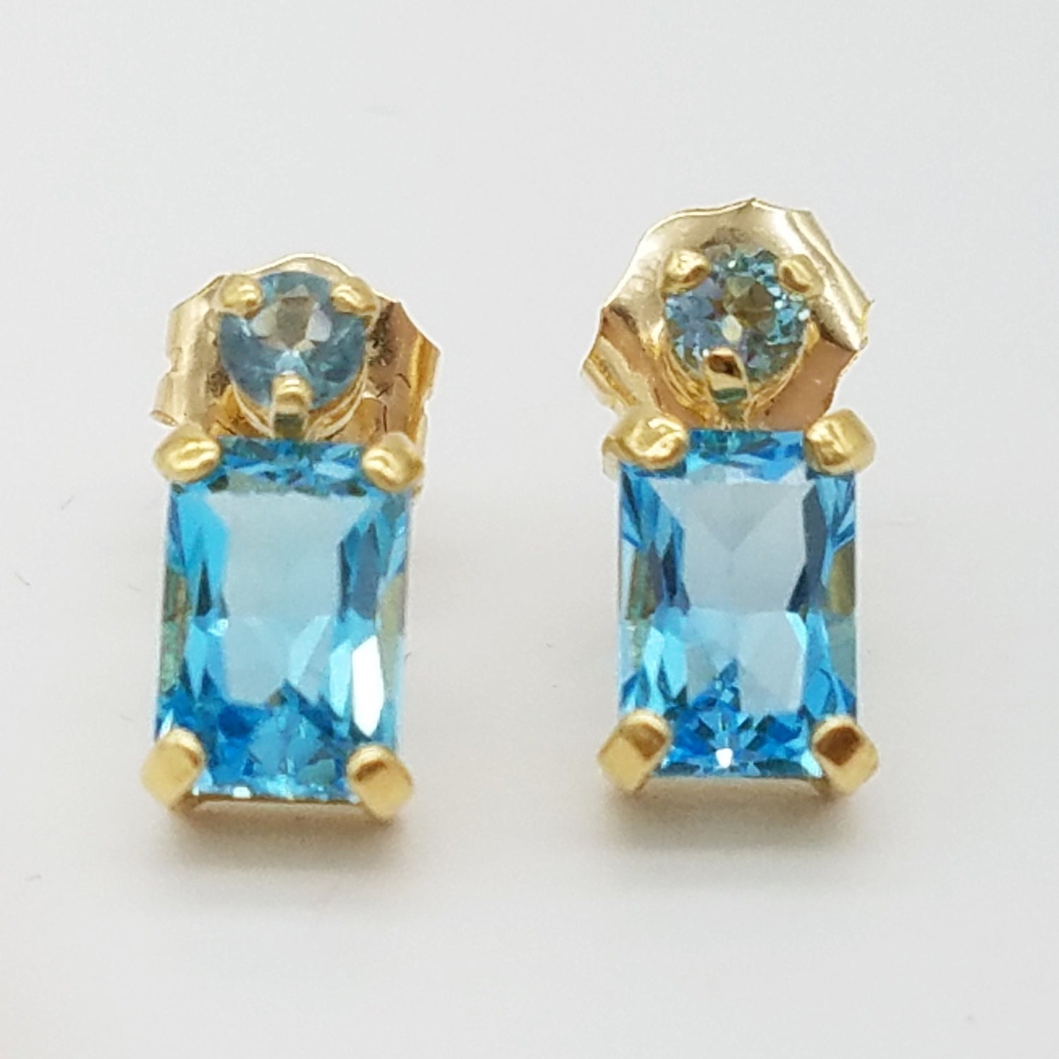 Emerald Cut Blue Topaz & Round Aquamarine Earrings in 14K