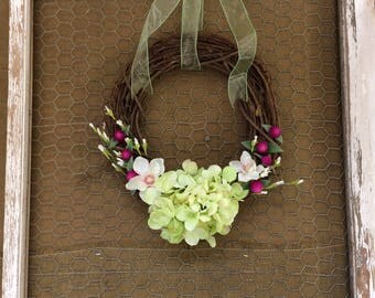 Window frame with wreath