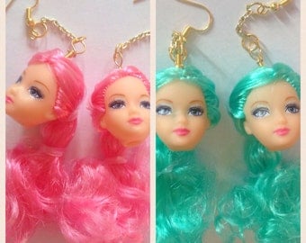 Dolls head earrings pink/teal/purple