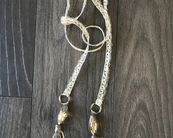 Necklace/scarf with metal tassels with crystal beads