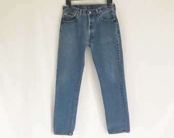Vintage 80's LEVIS 501 Straight Leg Jeans. Tagged size 35 x 38. Waist 32