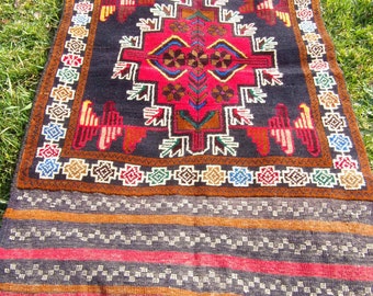 Red Baluchi rug/kilim from Afghanistan. 4ft 2" x 2 ft 6. 128 x 79 cm Hand woven.