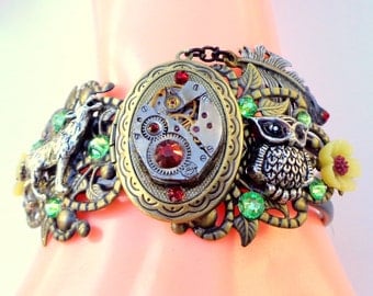 Dark Native Dream, Plight of Earth, Steampunk Locket Bracelet,Ruby Jeweled Watch Movement, Swarovski Crystals,Steam Punk Cuff,OOAK
