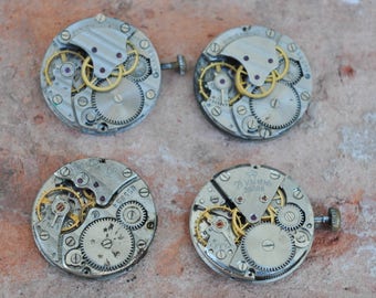 0.9 inch Set of 4 vintage wrist watch movements.