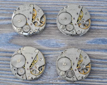 0.9 inch Set of 4 vintage wrist watch movements.