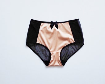 Hipster style satin panties. See through panties.