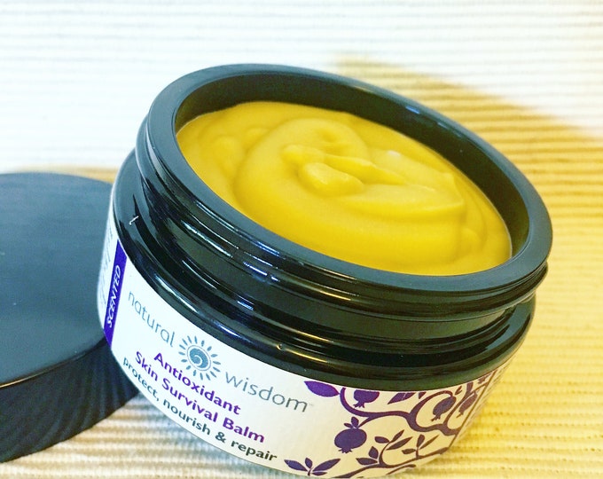 Raw Organic Balm blended with antioxidant seed oils and herbal extracts of Calendula & Chamomile for a healing Salve.