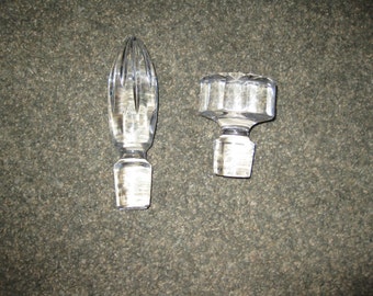 TWO LARGE HEAVY Antique Clear Glass Stoppers 3 1/2" Tall 2 1/2" Across and 6 1/4" Tall Both are 1" At The Bottom