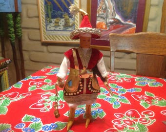 Vintage standing Mongolian folk doll in native garb