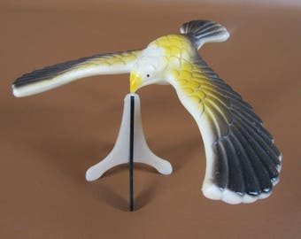 Plastic weighted balancing bird with stand