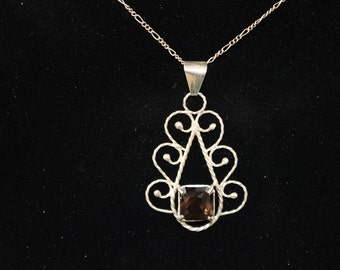 REDUCED!!! Faceted Smokey Quartz Pendant set in Sterling Silver.