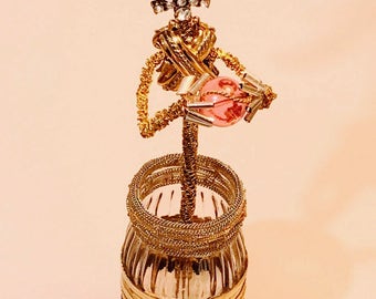 Cut flower from repurposed vintage jewelry makes an unusual gift