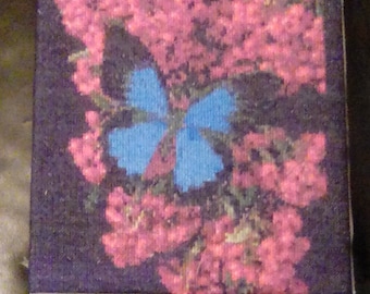 Butterfly on Berries completed cross stitch