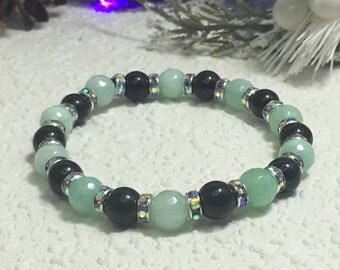 Shungite Bracelet (Polished Shungite 8mm with 8mm facetted Amazonite and a 6mm Crystal Rondell). Genuine Karelian Shungite.