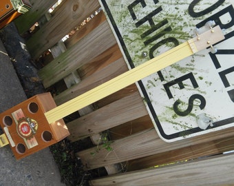 Three String Cigar Box Guitar made by Simple Cigar Box Guitars