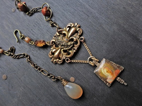 Ornate cast brass pendant necklace with vintage chain and braided leather- “Come What May”