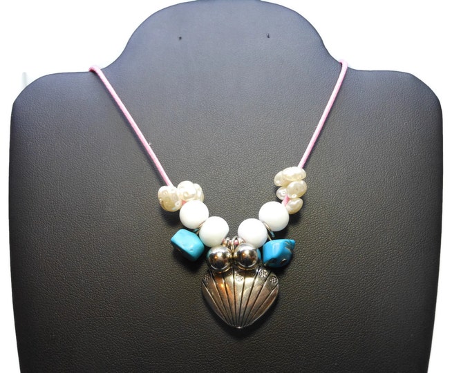 Heart necklace, silver tone heart charm and beads, white cats eye beads, turquoise chips and faux pearls on pink cording