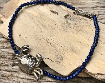 With a crab silver lapis lazuli bracelet. Bracelet silver and lapis lazuli. Bracelet silver crab. Crab silver.