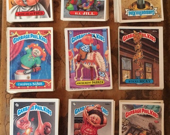 Rare one hundred and seventeen 1980s vintage Garbage Pail Kids sticker trading cards 80s punk stuff Glue sniffing fun teenage hobby Ramones