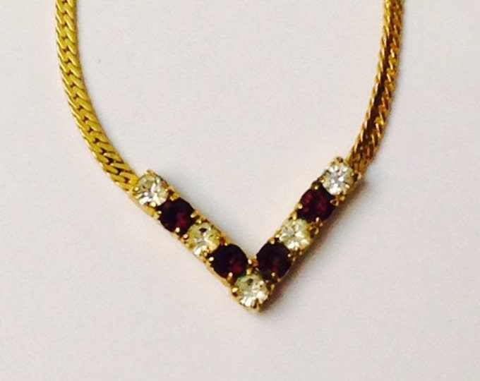 Storewide 25% Off SALE Vintage Gold Tone Herringbone Style Necklace With Diamond & Ruby Rhinestone V Shaped Pendant Featuring Elegant Design