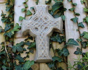 How can you make an outdoor cross decoration?