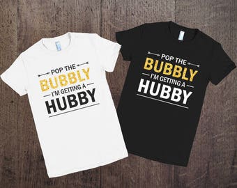 Pop the bubbly I'm getting a hubby, with Gold Glitter Text Pop the bubbly shirt Bride to be Gift. Bachelorette Tees Engagement party