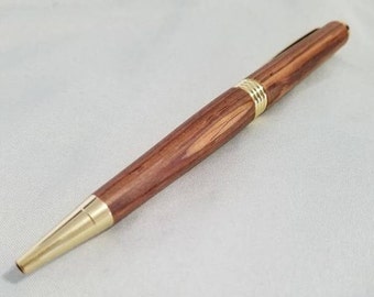 Customized world's first wooden ballpoint pen made almost