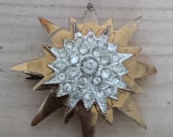 Vintage rhinestone starburst brooch