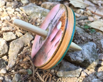 Recycled skateboard Spinning top toy