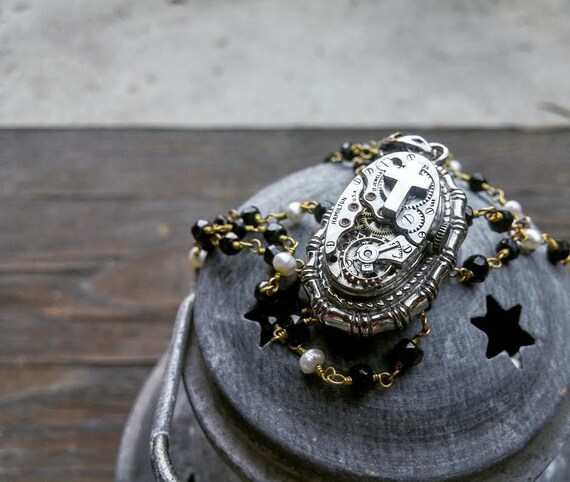 SaraBelle. Wire Wrapped Gold and Pearl, and Spinel Steampunk Goth Clockwork Casket Necklace. by MaumMaum steampunk buy now online SaraBelle. Wire Wrapped Gold and Pearl, and Spinel Steampunk Goth Clockwork Casket Necklace. by MaumMaum steampunk buy now online