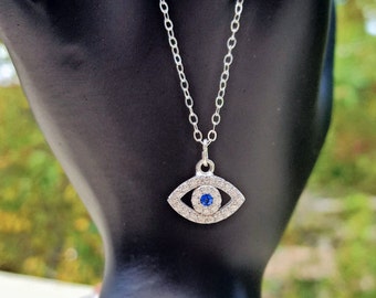 Items similar to Medium Silver Evil Eye Necklace - Handmade Silver ...