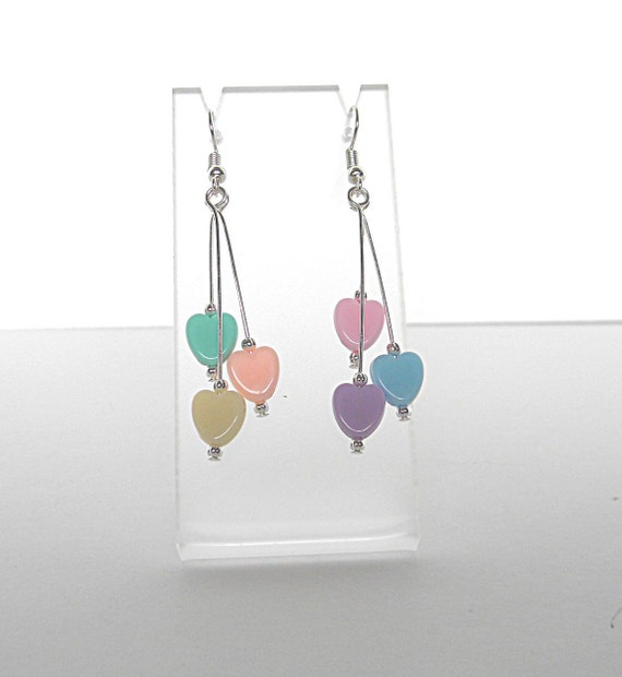 Items similar to Valentines Day heart earrings, long beaded heart