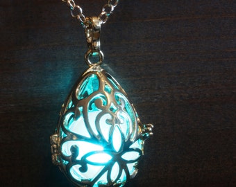 Glowing pendant, Glowing necklace, Glowing locket, Christmas gift for her, Glow in the dark Jewelry, Fairy, Golden, Drop shaped, Teal orb