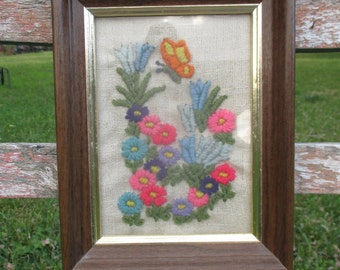 vintage framed yarn crewel featuring flowers and a butterfly, butterfly crewel, flowers crewel, colorful crewel, retro crewel, floral crewel