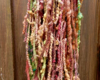 CORAL art yarn / wool / soft / knitting weaving felting / purple- yellow- and greentones / hand spun / hand dyed
