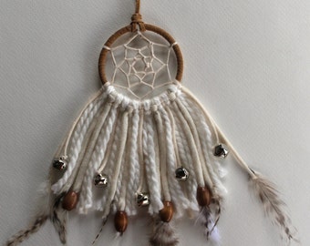 Crema (small size) with beads and bells