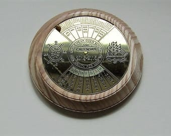 100 year perpetual calendar in Ash