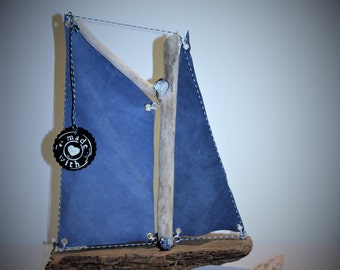 Extravagant sailing ship from driftwood and leather * driftwood sailboat with leather