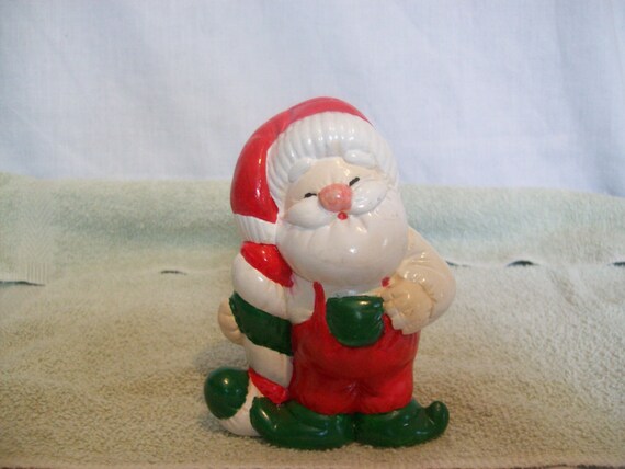 Hand painted ceramic Santa with a red, white and green candy cane. Santa decoration, Christmas decoration, Holiday Christmas ceramic figure