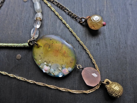 Layered pink and gold assemblage necklace with rose quartz and vintage bell - “This Moment”