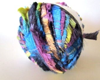 Cascade Yarns Lapin Ribbon wide smoooth center fringe sides Color 6189 blue/pink/green/magenta/yellow