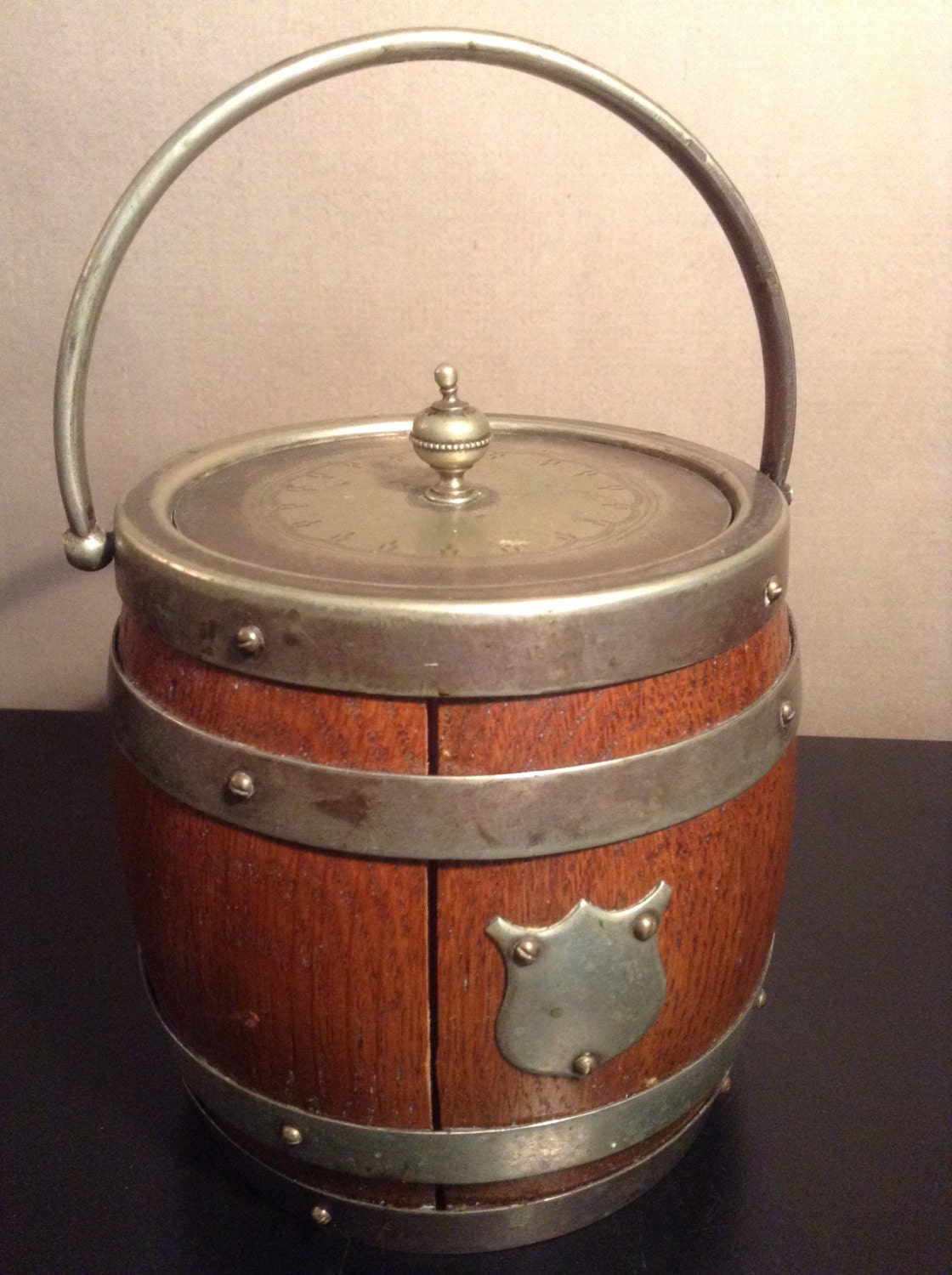 Antique English oak biscuit barrel with porcelain liner