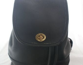 Backpack- Coach black Leather Daypack with Top Handle and adjustable straps #9960