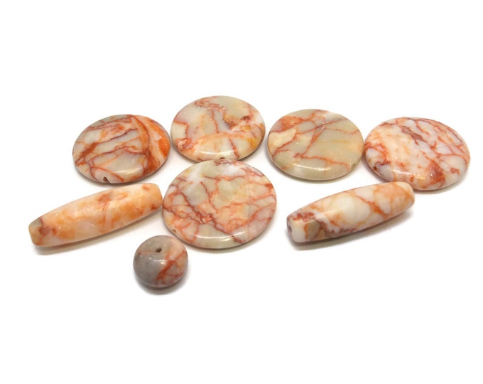 Redline marble beads, five 26-30mm flat round, two 31x10mm-32x10mm oval and one 12mm round bead, a ready made project!