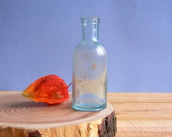 Old Small Light Blue Glass Bottle for Medicine Laboratory use. Home Photo Decor b15