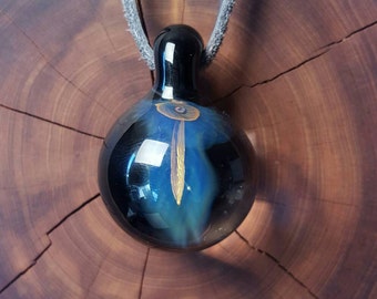 Silver and gold fumed deep lensed glass pendant