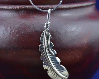 Sterling silver Navajo handmade Feather pendant 2" long